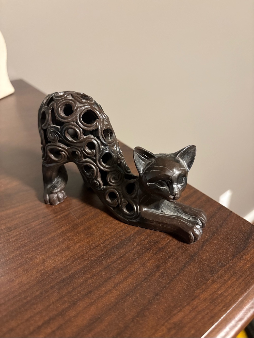 Decorative Dark Brown Cat Figurine with Carved Swirl Design